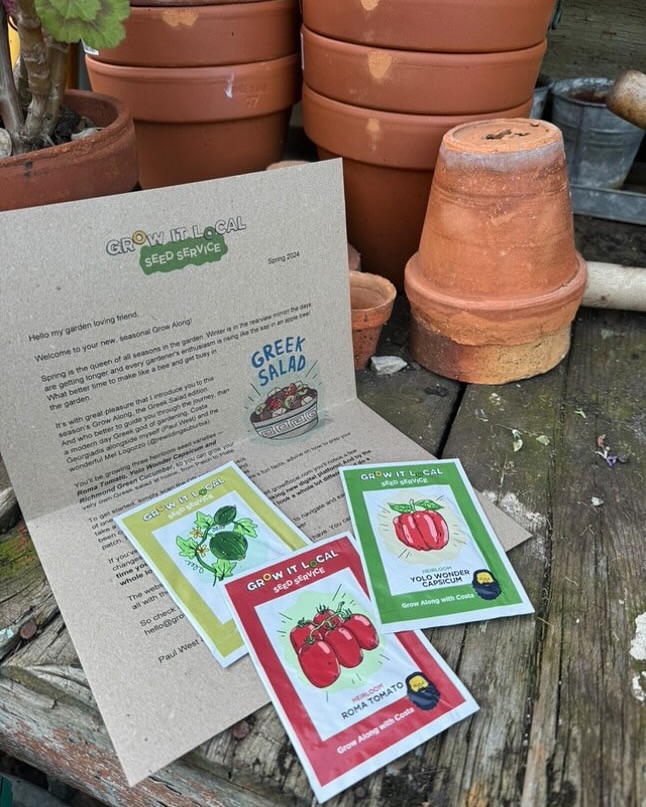 Grow It Local seed packs and garden pots.