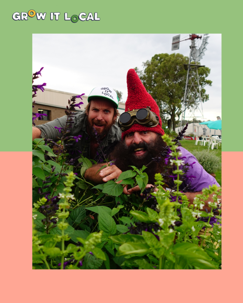 Two men gardening at community event.