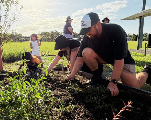 Community gardening under a sunny sky
